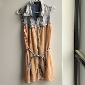 Distressed jeans and organza tunic. Fits like a M